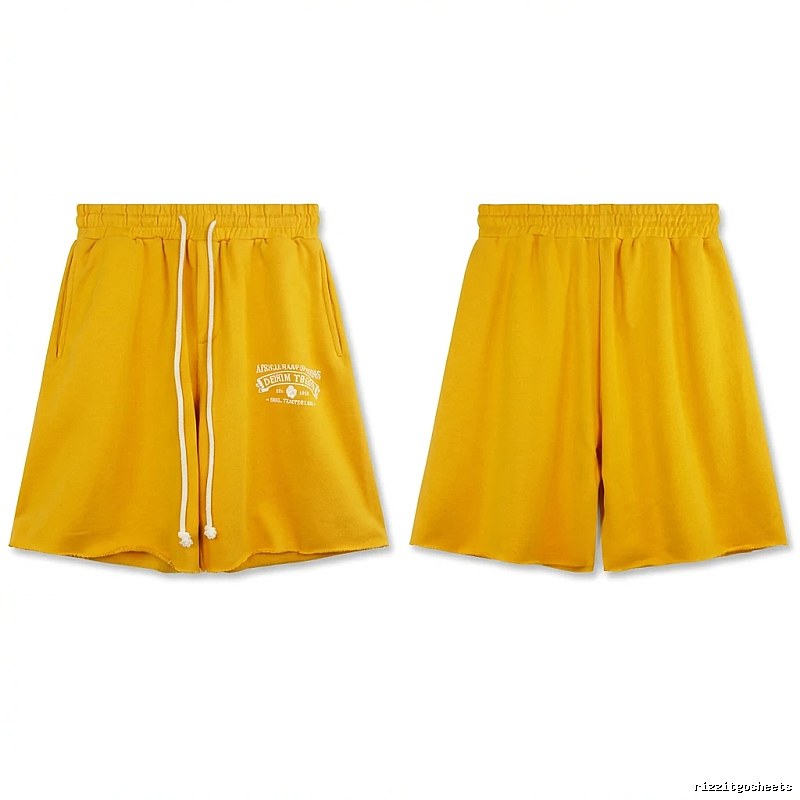 DENIM TEARS American-style yellow shorts
