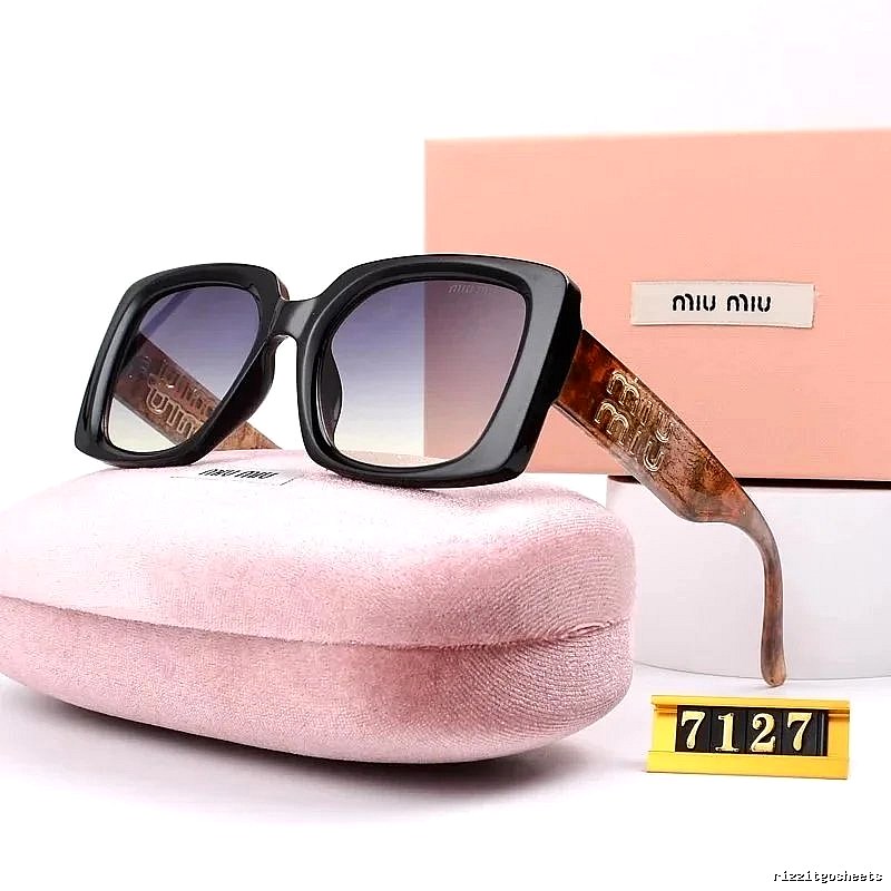 Miu Miu Gift Ready Oversized sunglasses Black Oval Sunglasses with Standout Detail