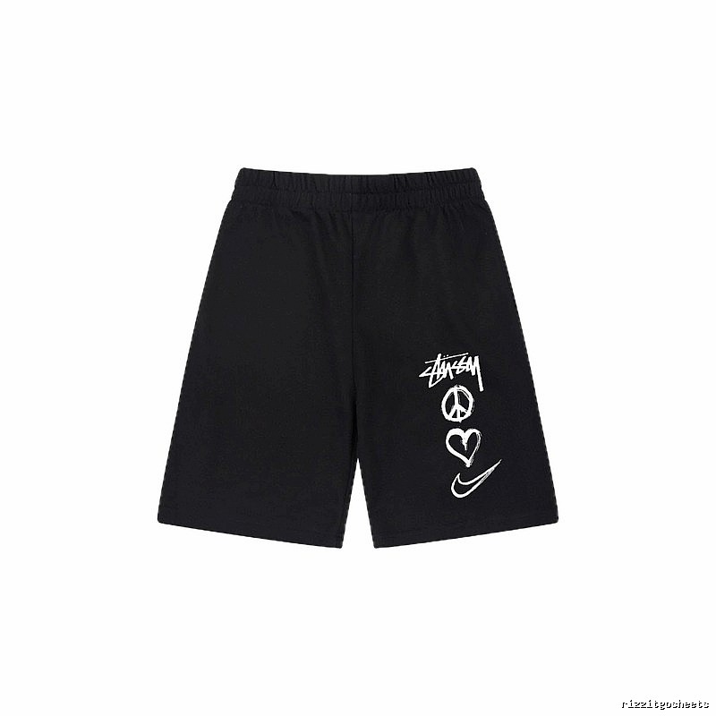Stussy graffiti-style black shorts